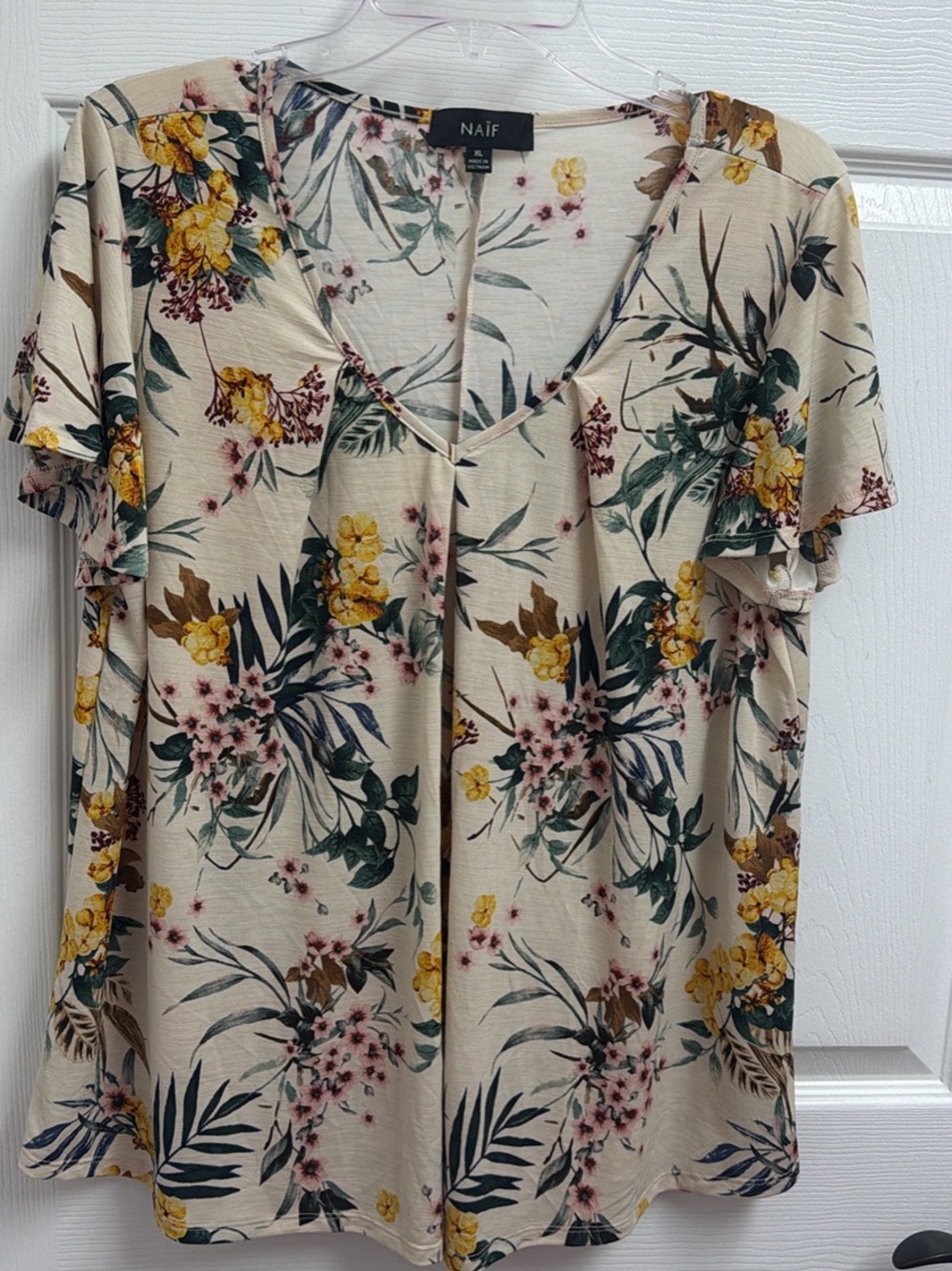 NAIF Cream Floral V-Neck Blouse with Yellow and Pink Blooms